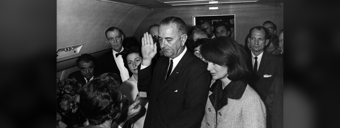 Lyndon B. Johnson sworn in as U.S. President aboard Air Force One following Kennedy assassination, November 22, 1963