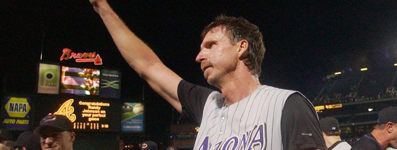 Baseball pitcher throwing a perfect game