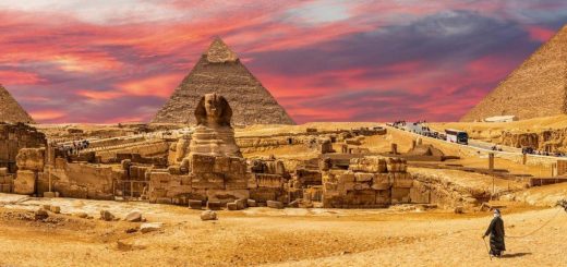 Ancient Egyptian pyramids at Giza with the Great Sphinx in the foreground